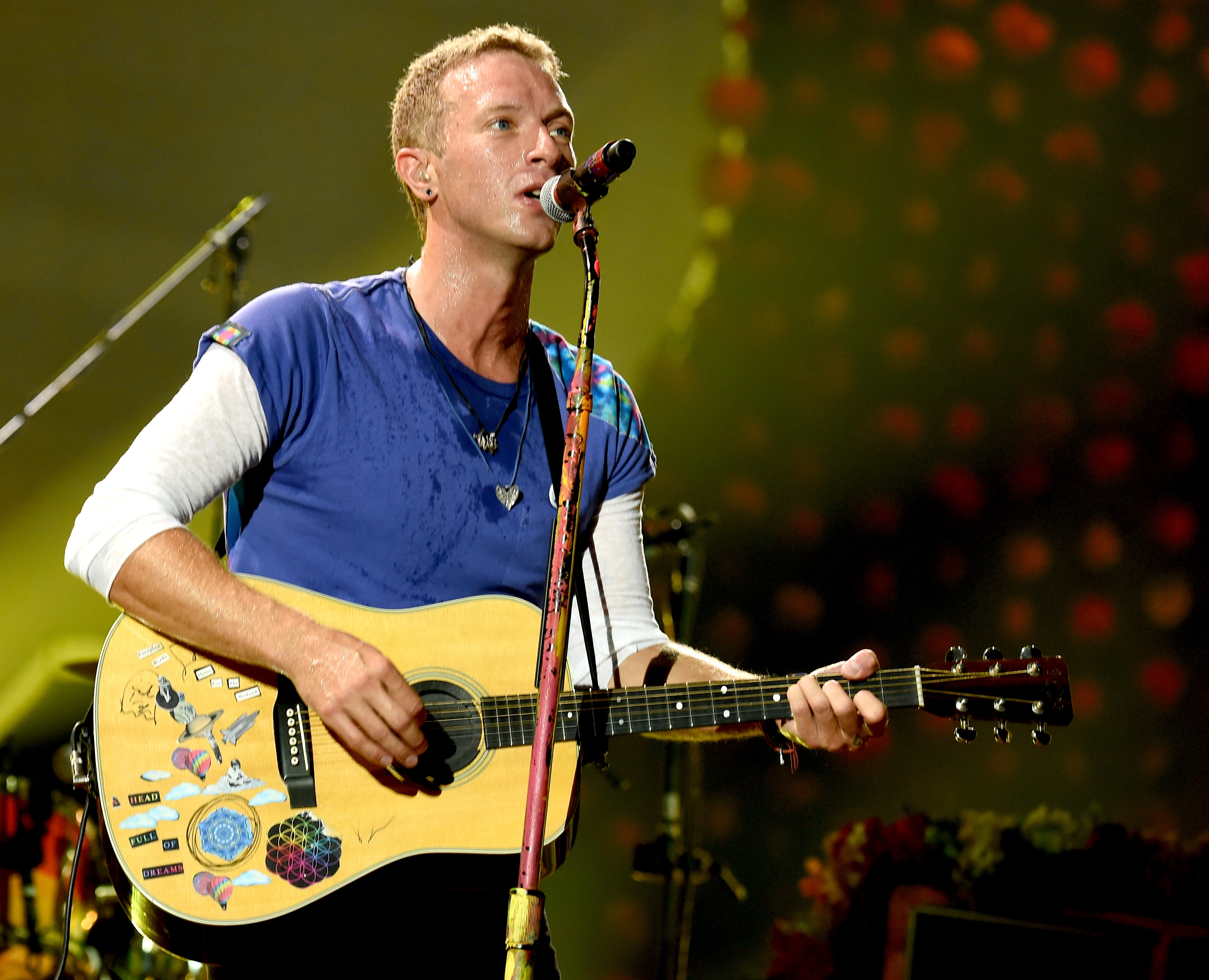 Coldplay Chris Martin performing in 2016