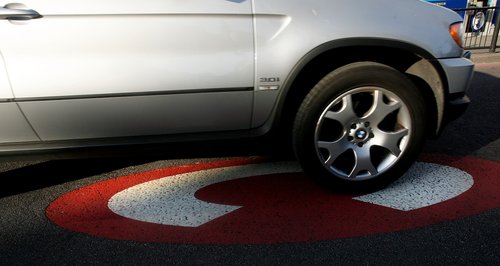 Car driving into congestion charge zone