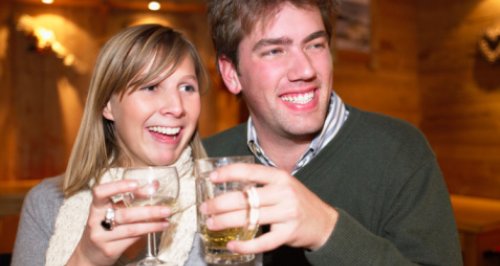 Couple drinking in a pub