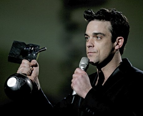 Robbie receives the award for Best Male