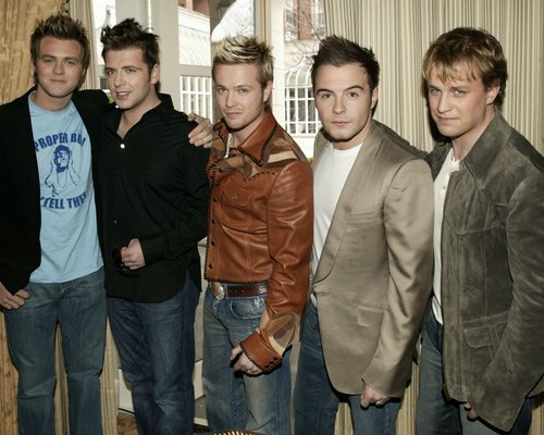 Westlife's Brian McFadden isn't pals with old bandmates who 'live