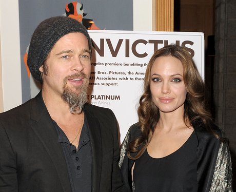 Brad Pitt and Angelina Jolie at a benefit dinner