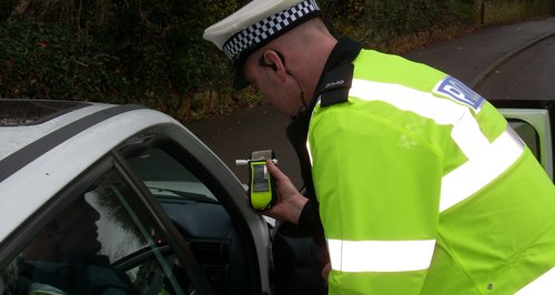 A&S Police carry out a breath test on a motorist