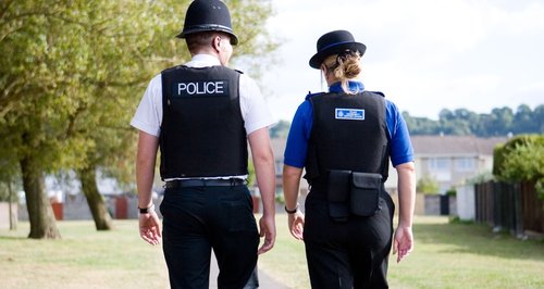 Police Officer and PCSO walking