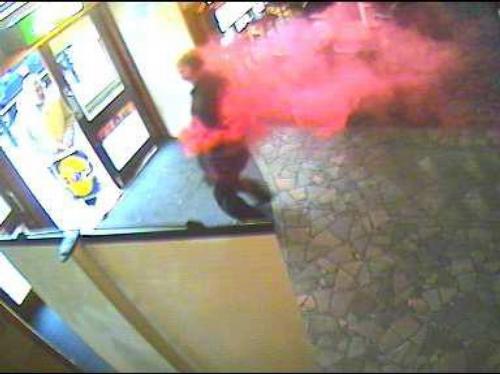 Suspect leaves bank covered in dye