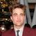 Image 9: The dashing Robert Pattinson wears a maroon suit at a premiere