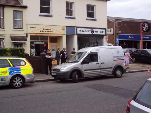 Police search garden in Portslade