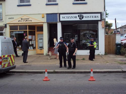 Police search garden in Portslade