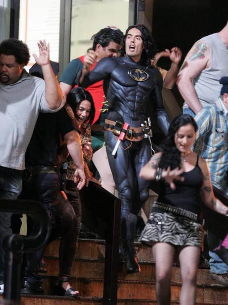 Russell Brand dresses as Batman on the set of Arthur - On set with the  stars - Heart