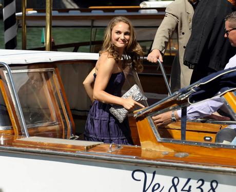 nata;ie portman arriving by boat