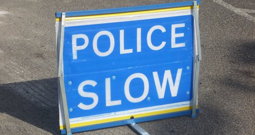 Police Slow Sign