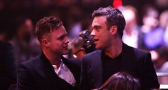 Olly Murs and Robbie Williams at the BRIT Awards
