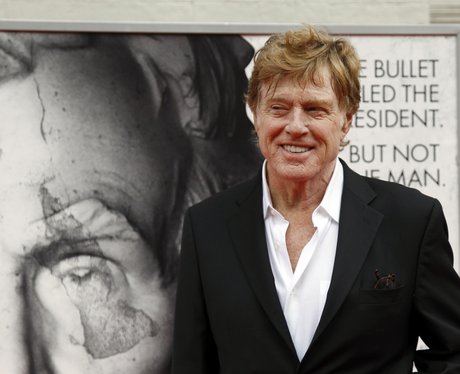 robert redford in a white shirt and jacket