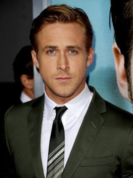 Ryan Gosling smoulders in a suit and tie