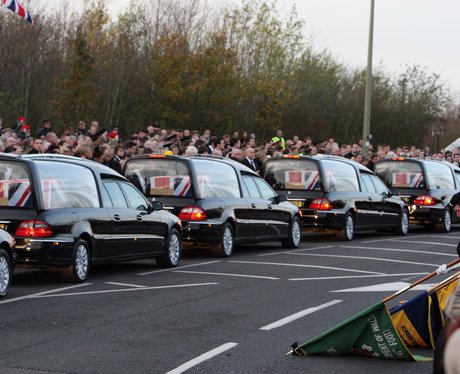 The bodies of four servicemen flown back to UK