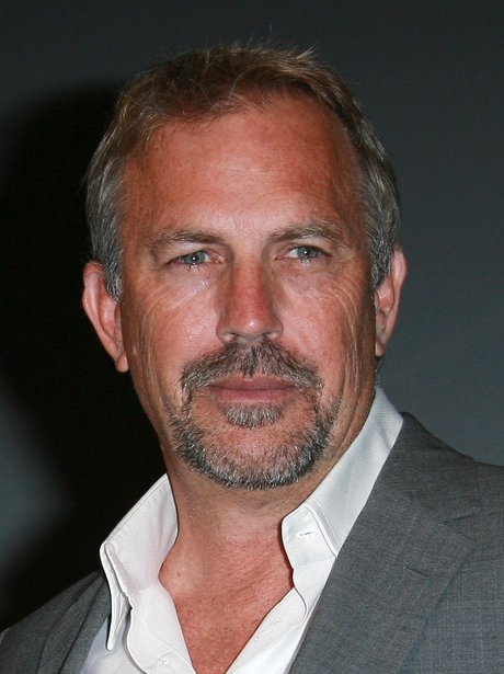 Kevin Costner in a white shirt