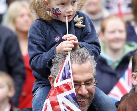 Young girl waits for Her Majesty