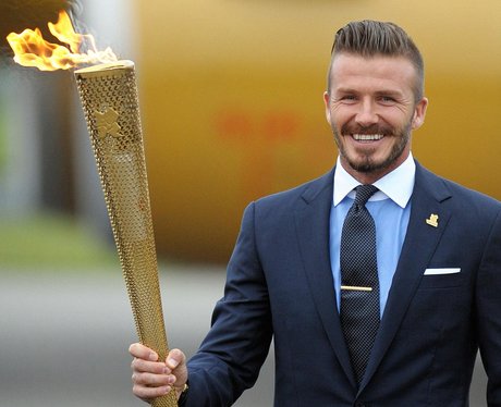 David Beckham with the Olympic Flame