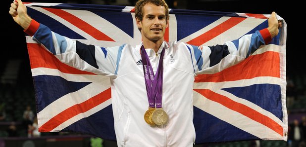 Andy Murray wears his Olympic medals