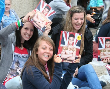 Fans have a giggle in the queue