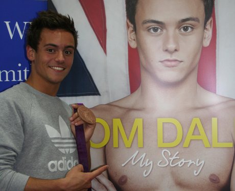 Tom Daley arrives with his Olympic Medal