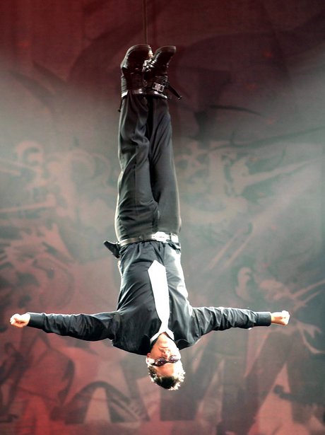 Robbie williams performing live at Knebworth.