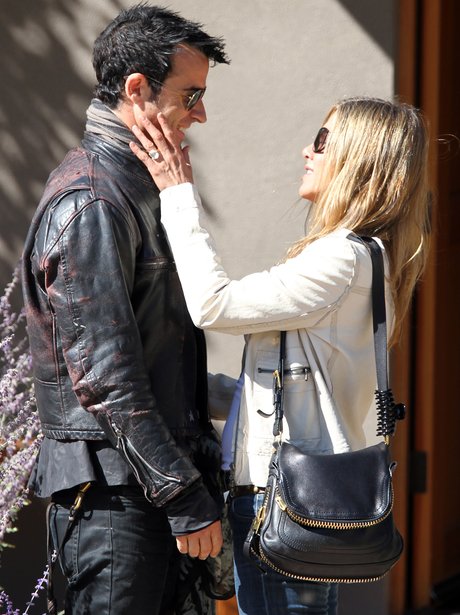 Jennifer Aniston and Justin Theroux with ring