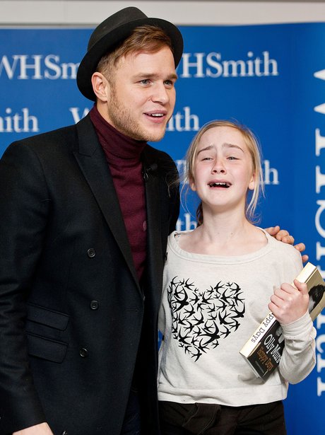 Olly Murs with crying fan at his book signing