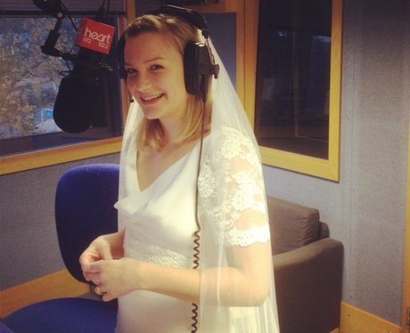 Molly presents the show in her wedding dress