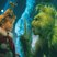 Image 6: A screen shot of the Grinch from the film 'Dr Seuss' How the Grinch Stole Christmas'.