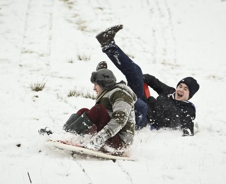 Boys sledging in Wales 