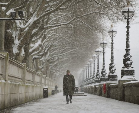 A man walks along Albert Embankment