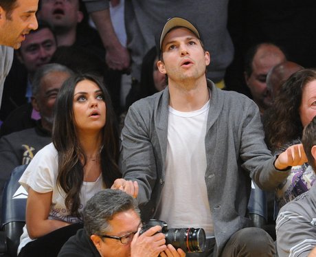 Mila Kunis and Ashton Kutcher attend basket ball