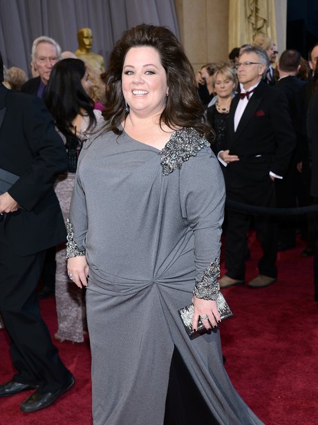 Melissa McCarthy attends the Oscars 2013 Red Carpe
