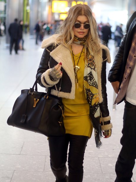 fergie wearing a leather jacket