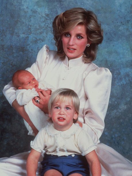 Princess Diana poses with a newborn Prince Harry and ...