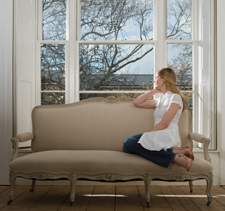 Woman looking out window