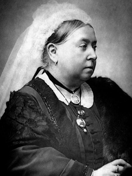 Queen Victoria in later life posing for portrait wearing veil