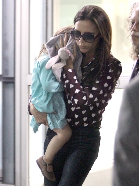 Victoria and Harper Beckham at JFK airport