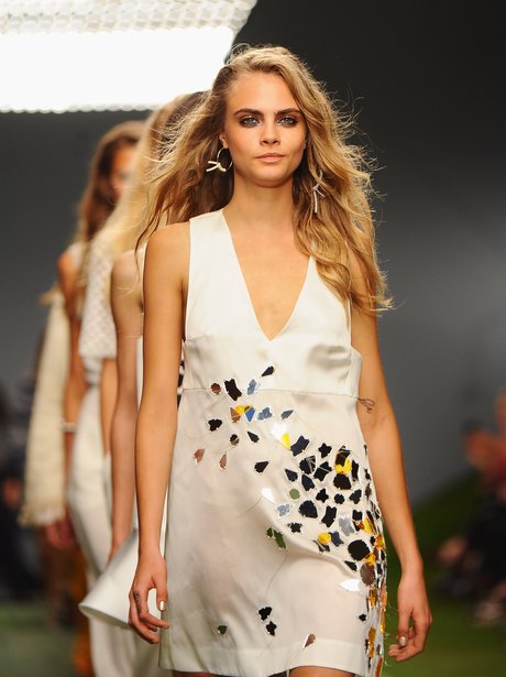 Cara Delevingne on the catwalk London Fashion Week