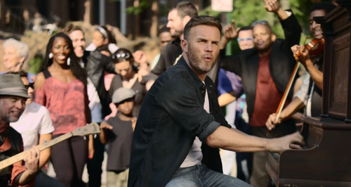 Gary Barlow in still from 'Let Me Go' music video