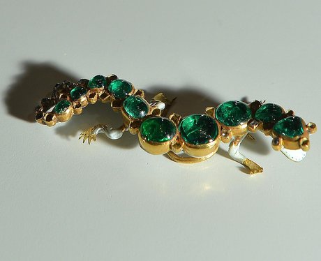 Precious green gem brooch