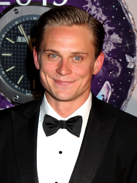 Billy Magnussen in tuxedo on the red carpet
