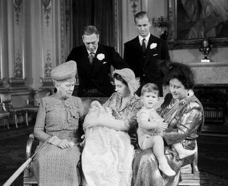 the queen holds baby princess anne