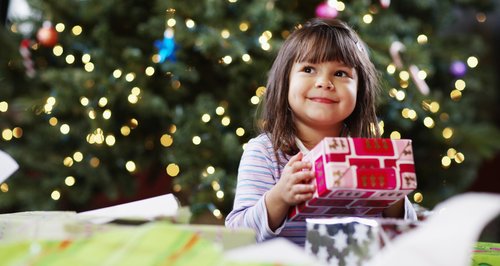 Christmas Child With Present Commerical 