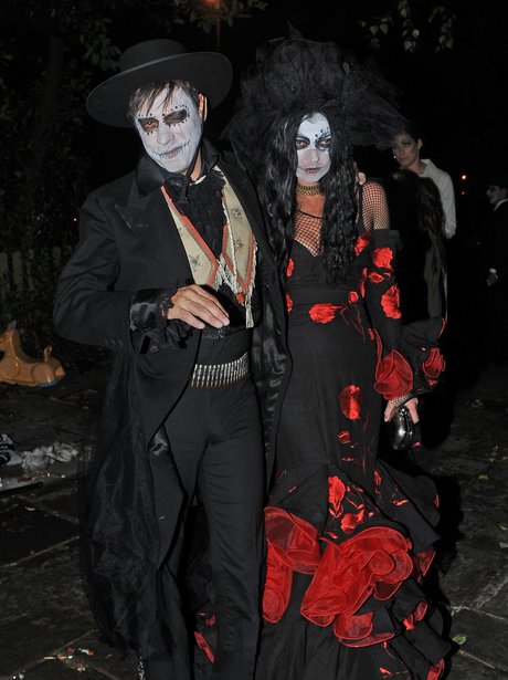 Kate Moss and Jamie Hince as Day of The Dead  skeletons 