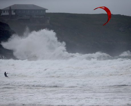 kite surfer rides the waves in cornwall