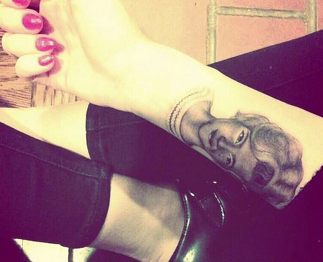 Miley Cyrus debuts her Grandmother tattoo on her arm