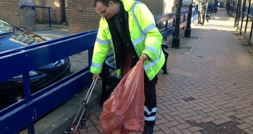 Street Cleaner Picks Up Litter In Wellingborough