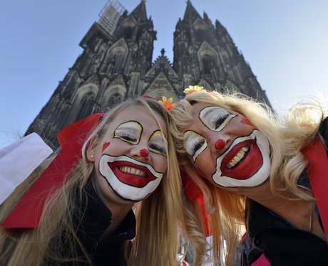 Two women dressed as clowns
